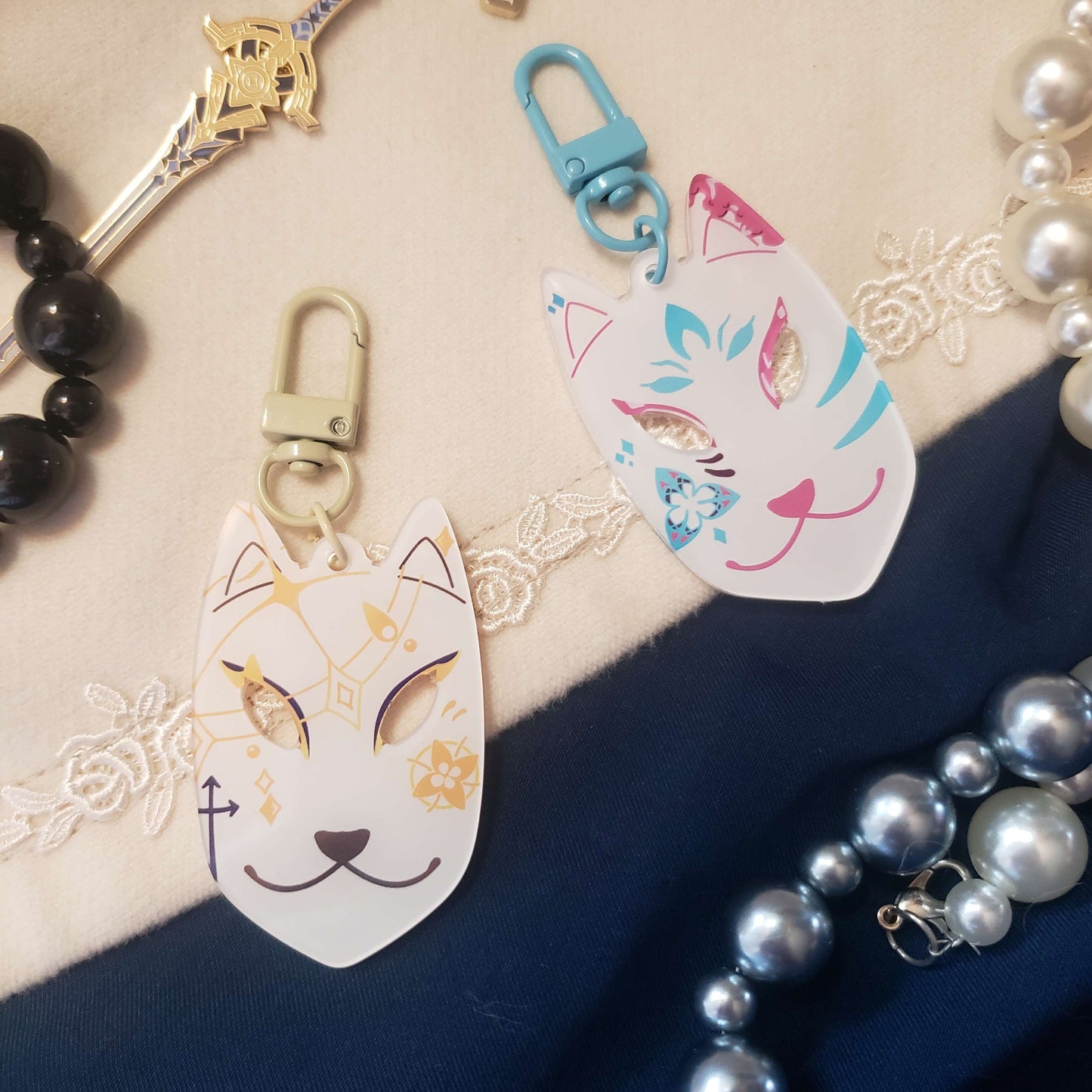 Solar Isomer and Fellflower Fox Mask Charms